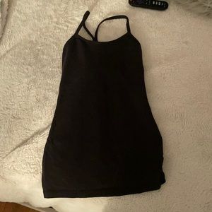 Black workout top that has a sports bra included/inserted in the top